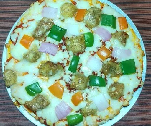 Aadab Chicken SausageTikka Pizza                             Simply Pizza with combination Cheese and Chicken Sausage with Sauce and Vegies 